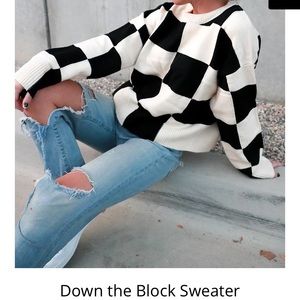 down the block checkered sweater